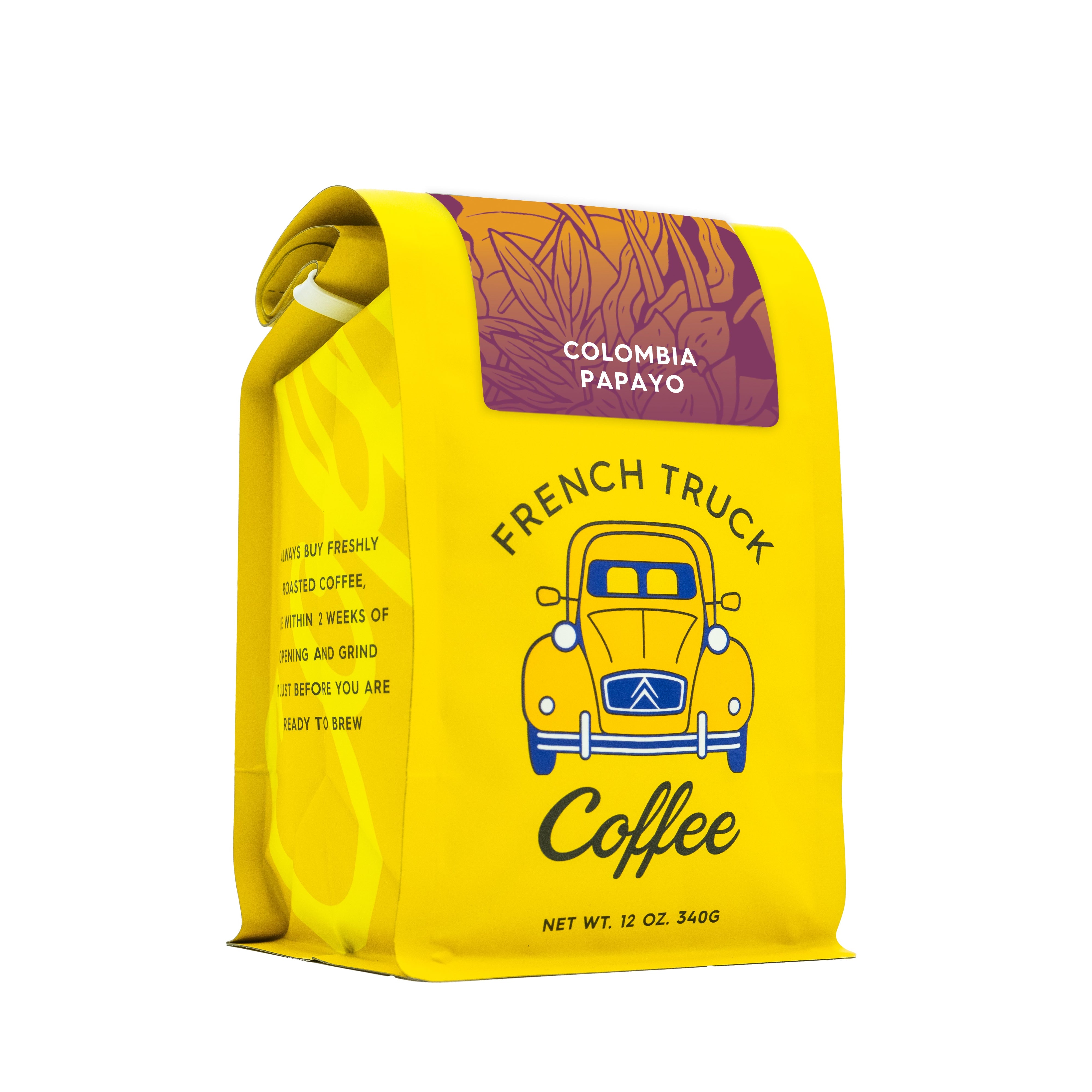 Yellow coffee bag with French Truck Coffee holding colombia papayo beans